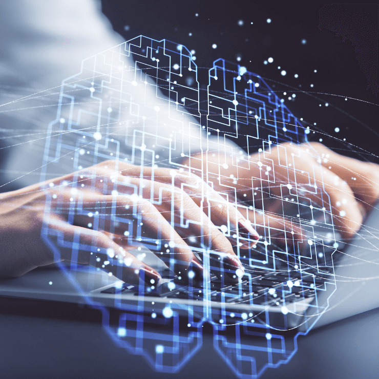 Hands typing on a laptop keyboard with a glowing digital brain overlay, symbolizing the collaboration between human creativity and artificial intelligence in writing.