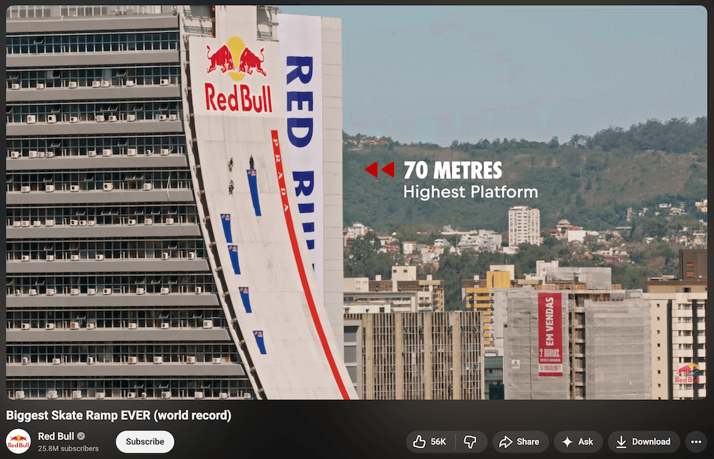 Screenshot of a YouTube video posted by Red Bull of a giant, 70-meter-high skateboard ramp attached to the side of a building covered with Red Bull branding.